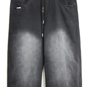 Men's solid jet black baggy fit jeans on hanger showing wide leg cut