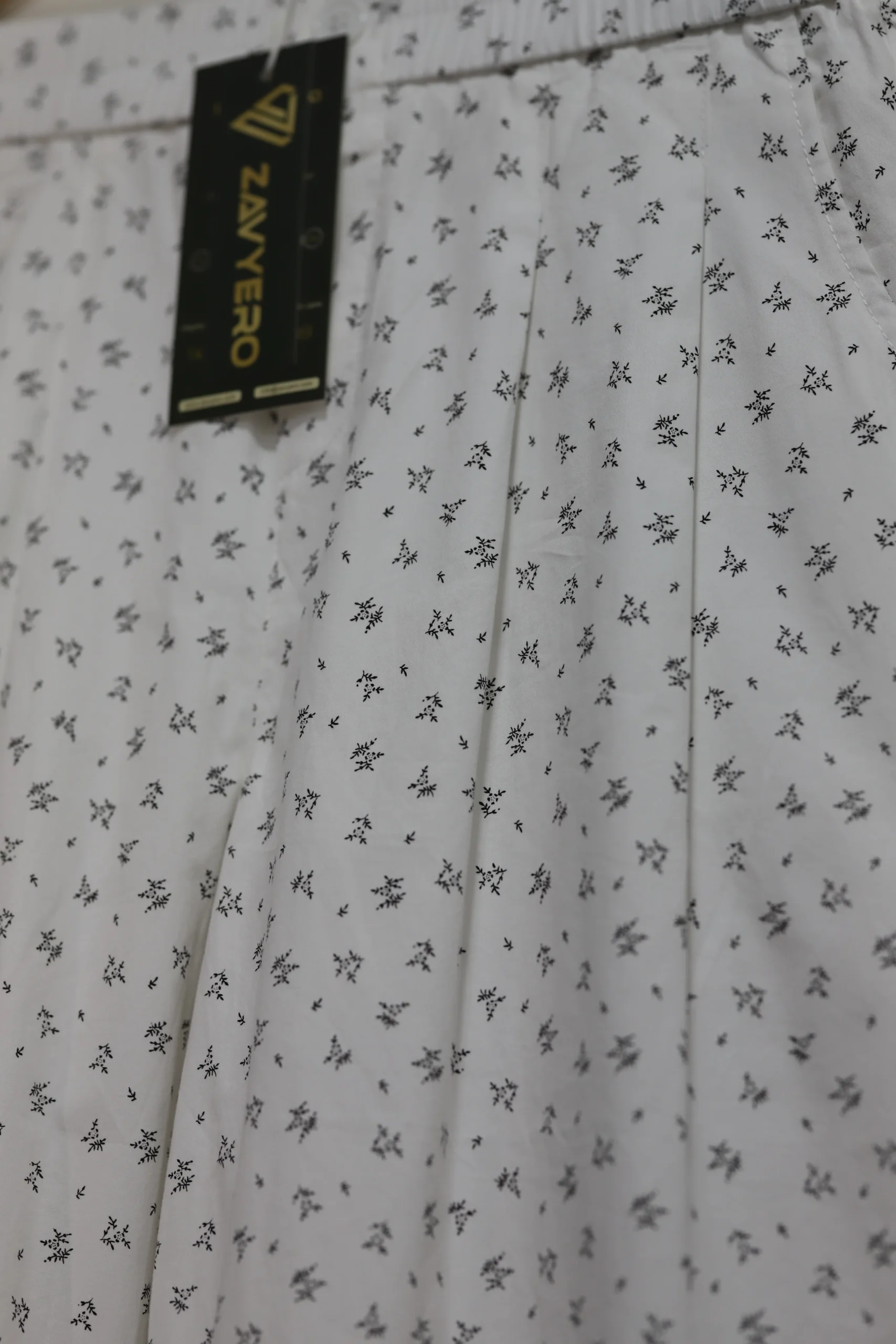 Women’s White Baggy Cotton Pants with Black Floral Detail - Image 6